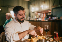 A man is sitting at a table
