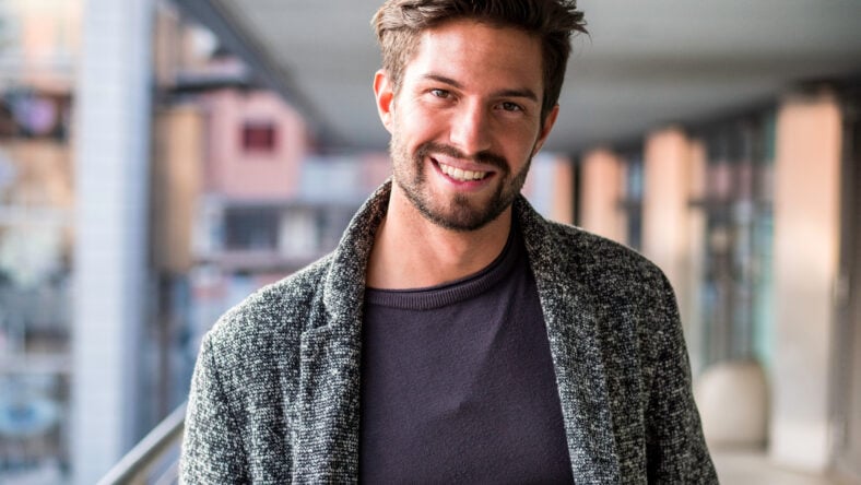 One handsome young man in urban setting