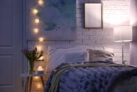 Cozy room interior with comfortable bed. Modern