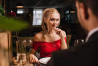 selective focus of attractive woman flirting with