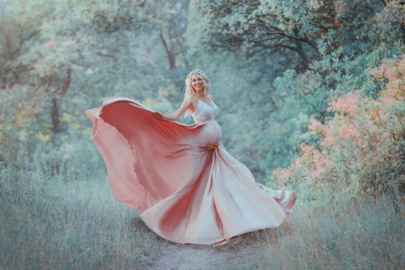 a sweet spring pregnant girl with light