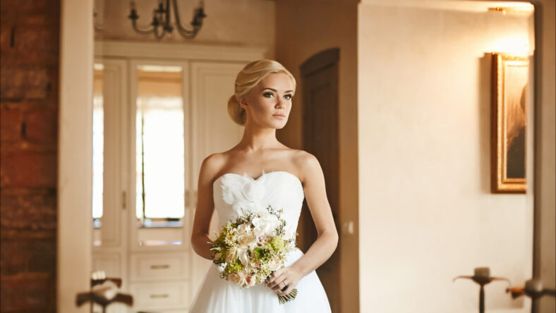 Beautiful and fashionable blonde model girl with