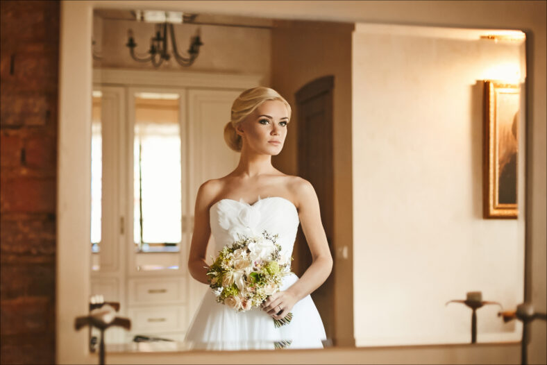 Beautiful and fashionable blonde model girl with