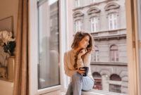 Romantic female model in good mood looking