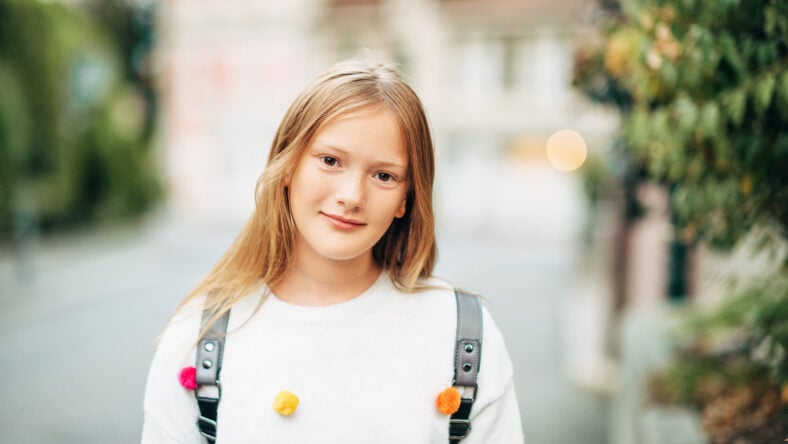 Outdoor portrait of adorable 10-12 year old
