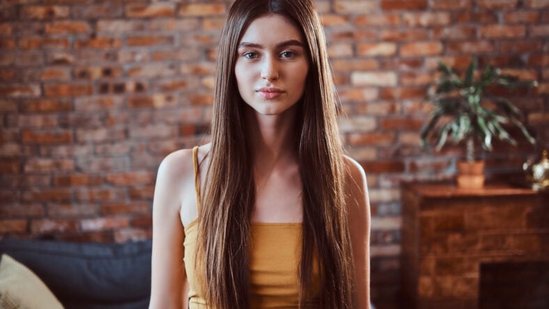 Portrait of beautiful young woman with long