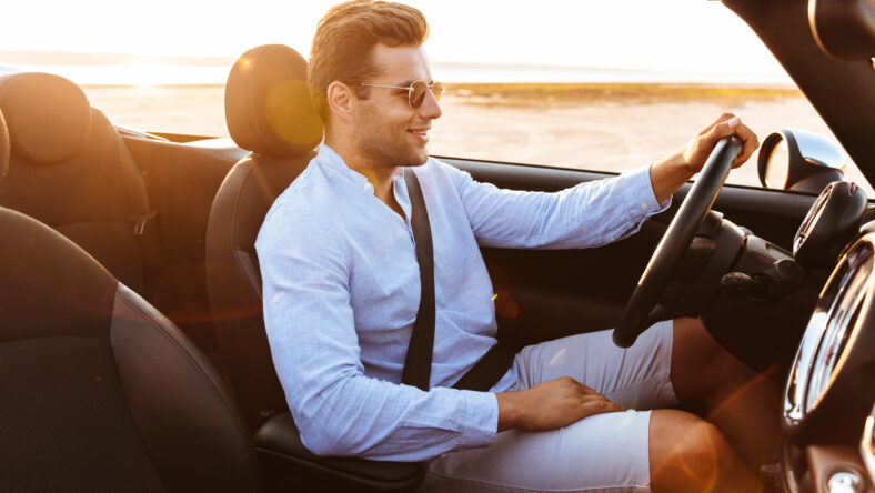 Photo of attractive caucasian man wearing sunglasses