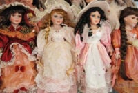 Porcelain dolls wearing dresses