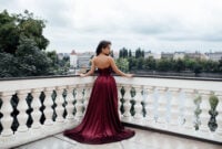 Young pretty lady in dress with bare