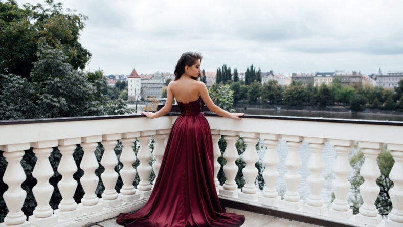 Young pretty lady in dress with bare