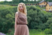 blonde girl in lavender field in summer