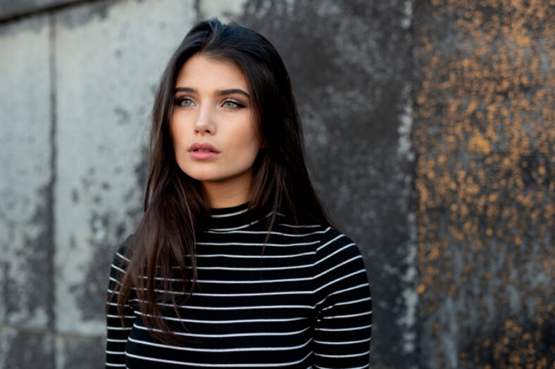 Horizontal view. Profile of a young beautiful