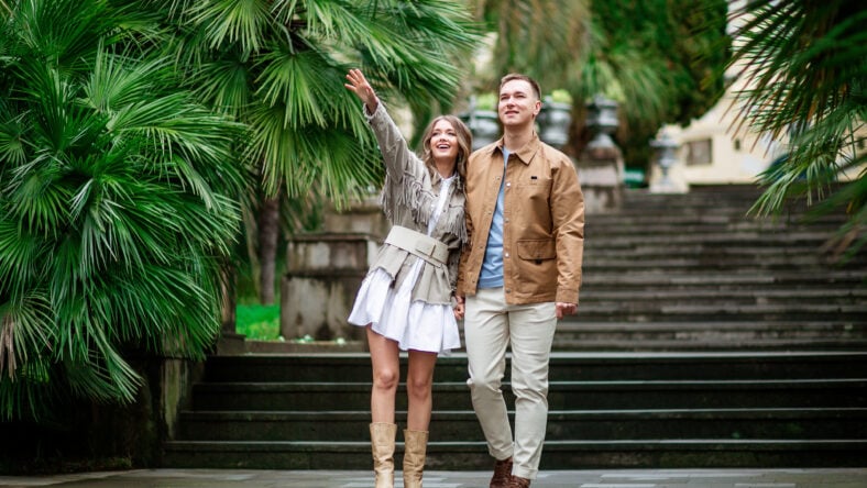 A happy couple in love walk in