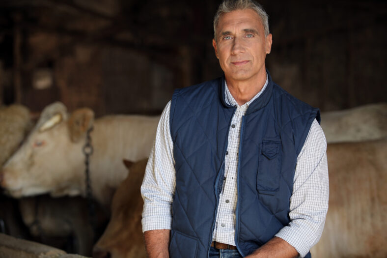 farmer in his cow farm