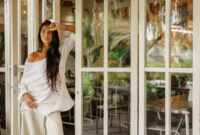 Brunette Woman stand near the big white