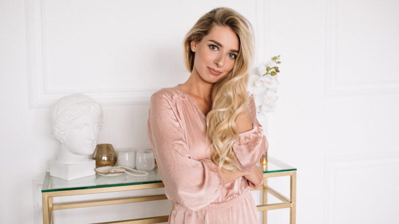 blonde girl in a pink dress