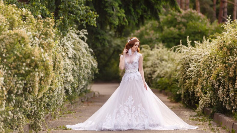 Beautiful redhead Bride in fantastic wedding dress