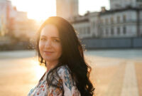 Pretty young woman with long curly hair