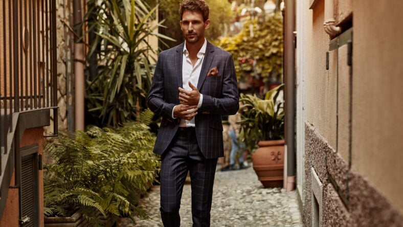 Young handsome man in classic suit with