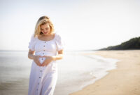 Happy pregnant woman spending time on a