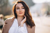 Portrait of woman in white shirt and