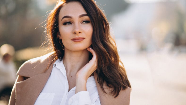 Portrait of woman in white shirt and