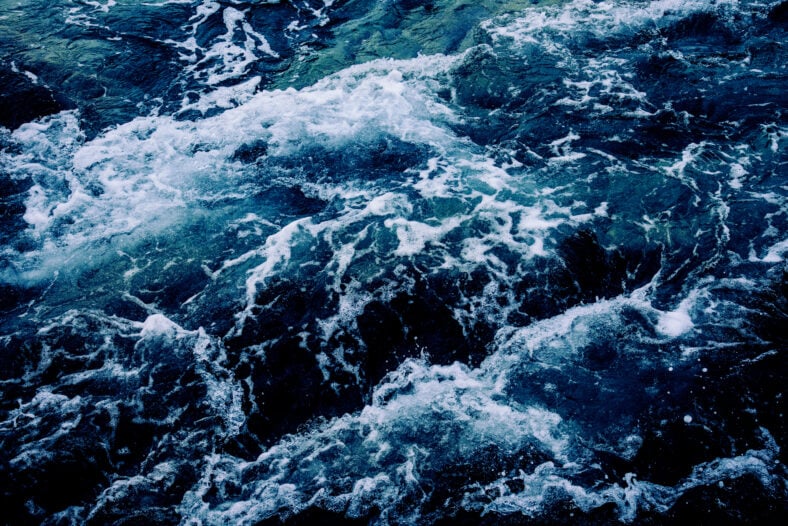 Dramatic sea waves storm from aerial view.