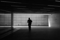 Silhouette of a man walking in a