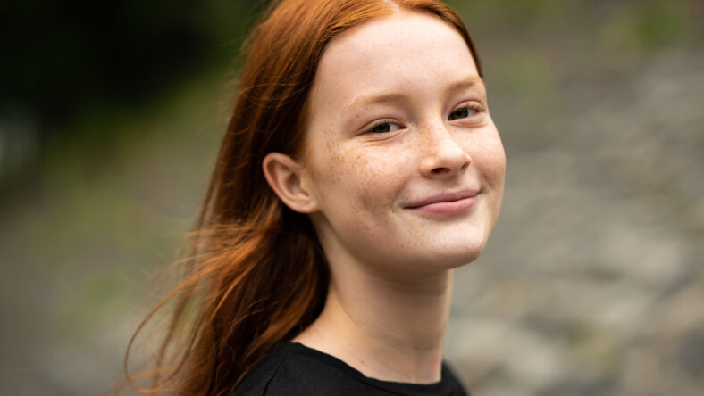 Red haired twelve year old girl with