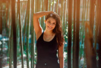 Young Latina woman smiling at the camera,
