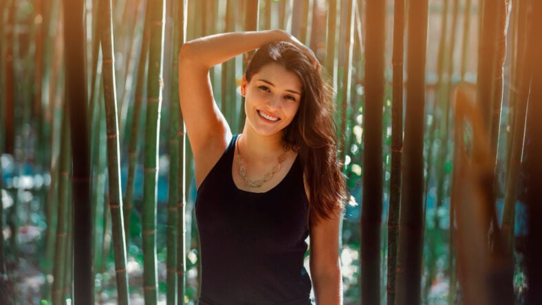 Young Latina woman smiling at the camera,