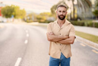 Portrait of handsome bearded latin man with