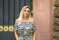 Attractive blond woman in a stylish off