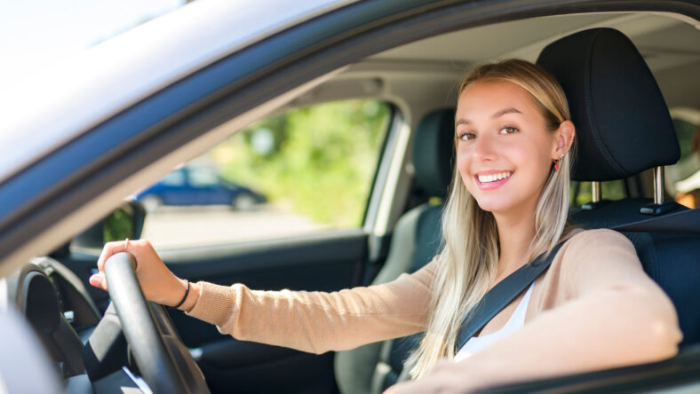 A car driver woman happy owner of