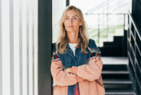 Portrait of a confident blonde woman standing
