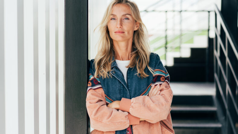 Portrait of a confident blonde woman standing