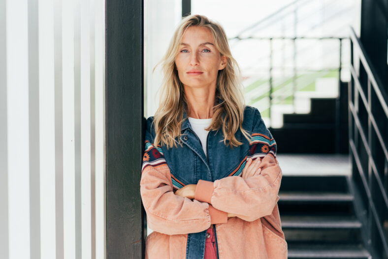 Portrait of a confident blonde woman standing
