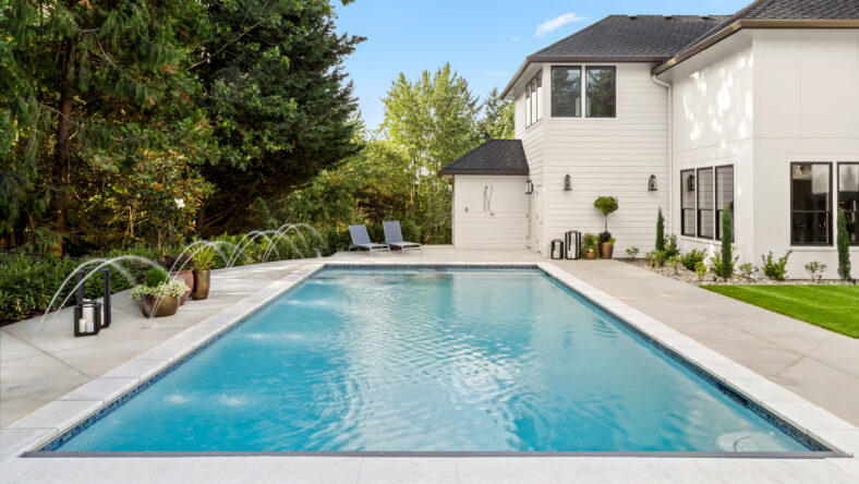 Beautiful home exterior and large swimming pool