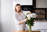 Happy and joyful young woman in white