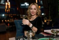 woman in a restaurant with champagne in
