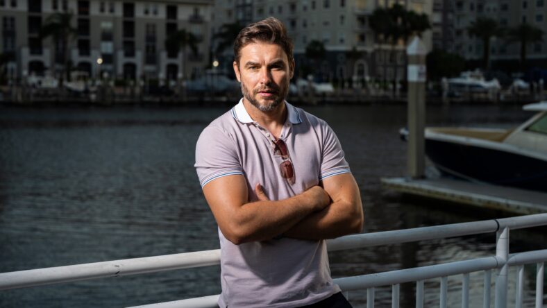 Portrait of handsome male model outdoor. Stylish
