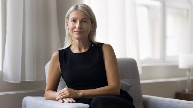 Portrait of beautiful middle-aged woman smile look