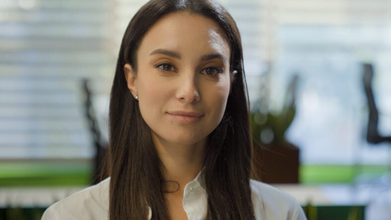 Beautiful pretty Caucasian confident female business woman headshot attractive face expression looking at camera posing alone at home office indoors businesswoman girl professional close up portrait. High quality 4k footage
