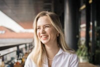 Portrait of beautiful young laughing blonde woman