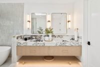 Modern bathroom with marble countertop and dual