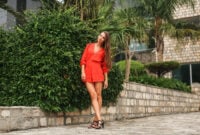 girl in red dress in the garden