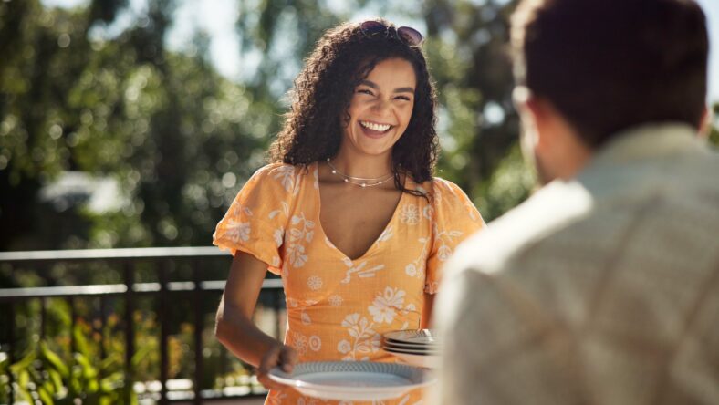 Friends, plate and happy with cooking outdoor