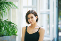 Portrait of young beautiful woman with a