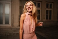 A radiant woman wearing a chic pink