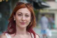 Natural portrait of a confident smiling redhead